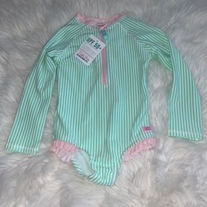 Ruffle Butts brand SPF built swimsuit peplum.